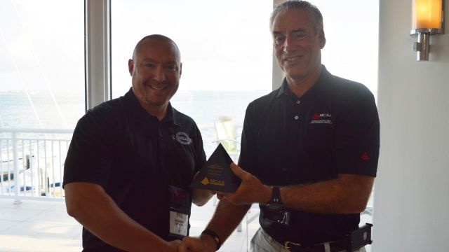 MCAA Chairman Mark Kemp (right) presents the first place MCAA Safety Advantage Award for Less than 100,000 Hours to Paul Cantarella from Cantarella & Son, Inc.