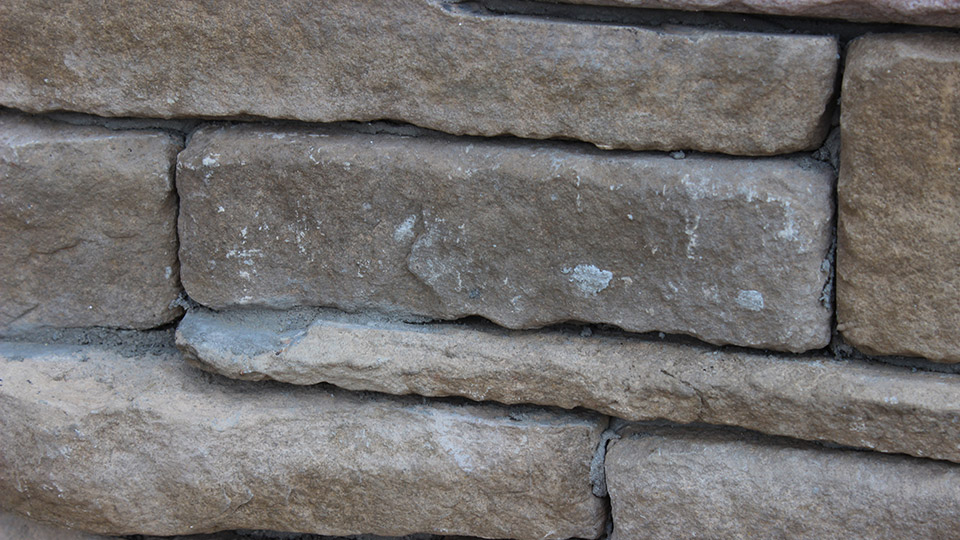 Even when applying stone from the top down mortar will inevitably find its way to the face of the adhered veneer, requiring cleaning. This also especially occurs when grouting a stone profile that’s not stacked.
