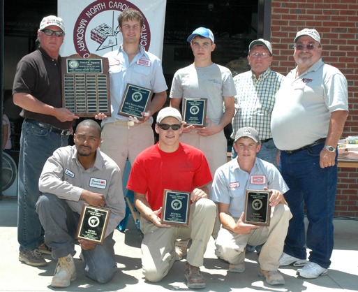 Shown bottom (left to right): Fifth-place finisher, Lamar O&rsquo;Neal, Brodie Contractors; fourth-place finisher and 2010 defending champion Cory Huneycutt, Paul&rsquo;s Masonry; and third-place finisher, Landon Huntley, McGee Brothers. Top (left to right), Contest Chairman Gary Joyner; 2011 Champion Wriston McGee; second-place finisher Kale Hallman of McGee Brothers; Contest Head Judge Freddy Koontz; and NCMCA President Larry Kirby.  
