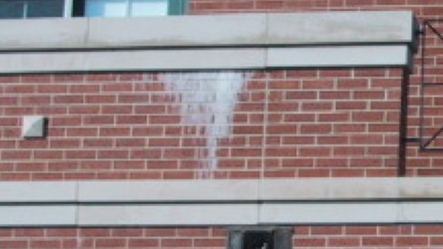 Calcite streaks are sometimes called “lime run”, appearing as a flow from moisture exit points.