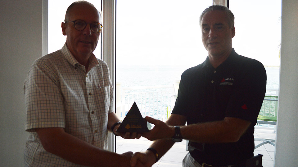 MCAA Chairman Mark Kemp (right) presents the first place MCAA Safety Advantage Award for Less than 100,000 Hours to Paul Odom from Legacy Masonry, LLC