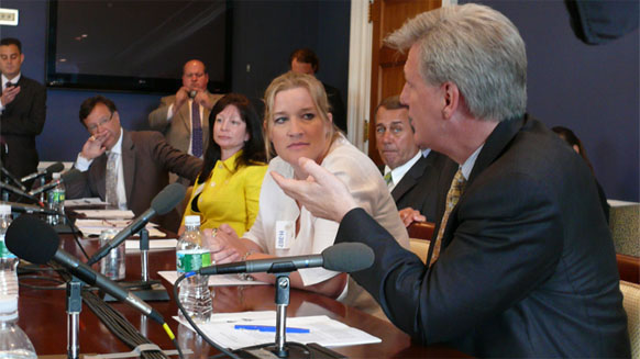 MCAA member Beverly McCauley (center) from Falls Church Construction participated in the round table of small businesses to discuss the impact this legislation will have on their businesses.