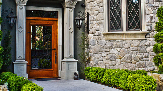 Sandstone tile was also used for the entranceway and natural stone for the wall cladding.