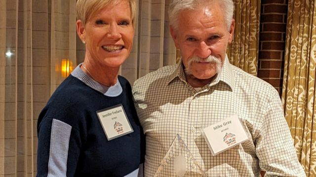 Jennifer Freiland (left), Clem Hellmann’s daughter, and Mike Gray, at the Arizona Masonry Council 2023 annual meeting in Flagstaff.