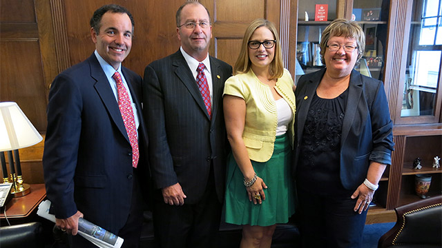 From left to right: Matt Keelen, Mike Sutter, U.S. Representative Kyrsten Sinema (AZ-9), Colleen Sutter